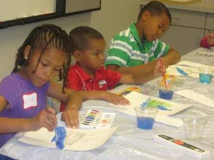 Kids painting in a 2014 Kaelidoscope program
