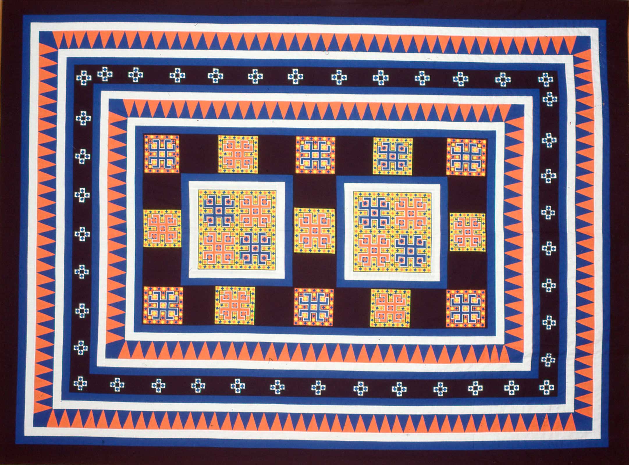 Applique and reverse applique tapestry made by Shoua Moua Chang in Ban Vinai Refugee Camp, Thailand, 1984